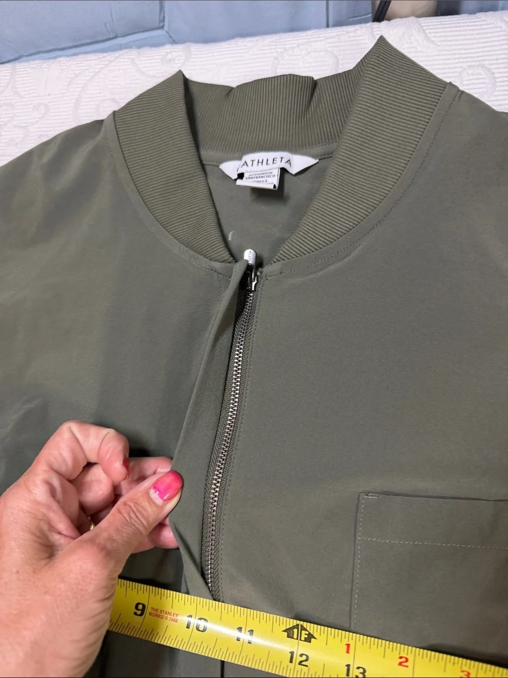 Athleta Brooklyn long sleeve jumpsuit. Size 16 deep green NWT.